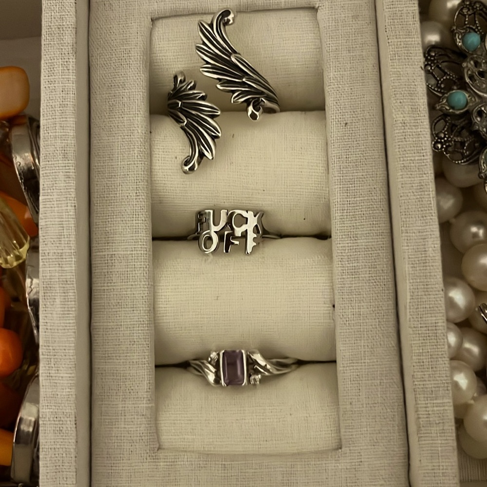 Top two are adjustable. Bottom is a 7. #1 and 3 are sterling. All 3/$40
